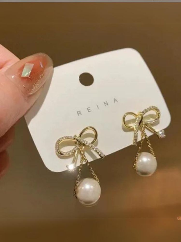 Golden Bowknot Pearl Danglers